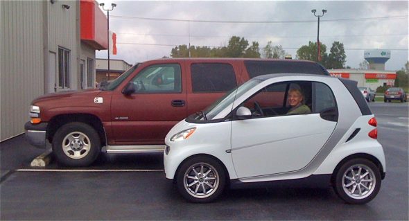 Smart Car next to Suburban